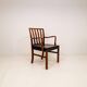 Mid-century armchair by Ole Wanscher for Fritz Hansen, stained beech and leather.