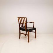 Fauteuil mi-siècle Ole Wanscher pour Fritz Hansen, hêtre teinté et cuir