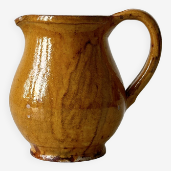 Provencal pitcher in yellow ceramic