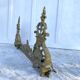 Antique brass fireplace set, bar and andirons, Napoleon I style.