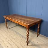 Antique cherry wood dining table from France.