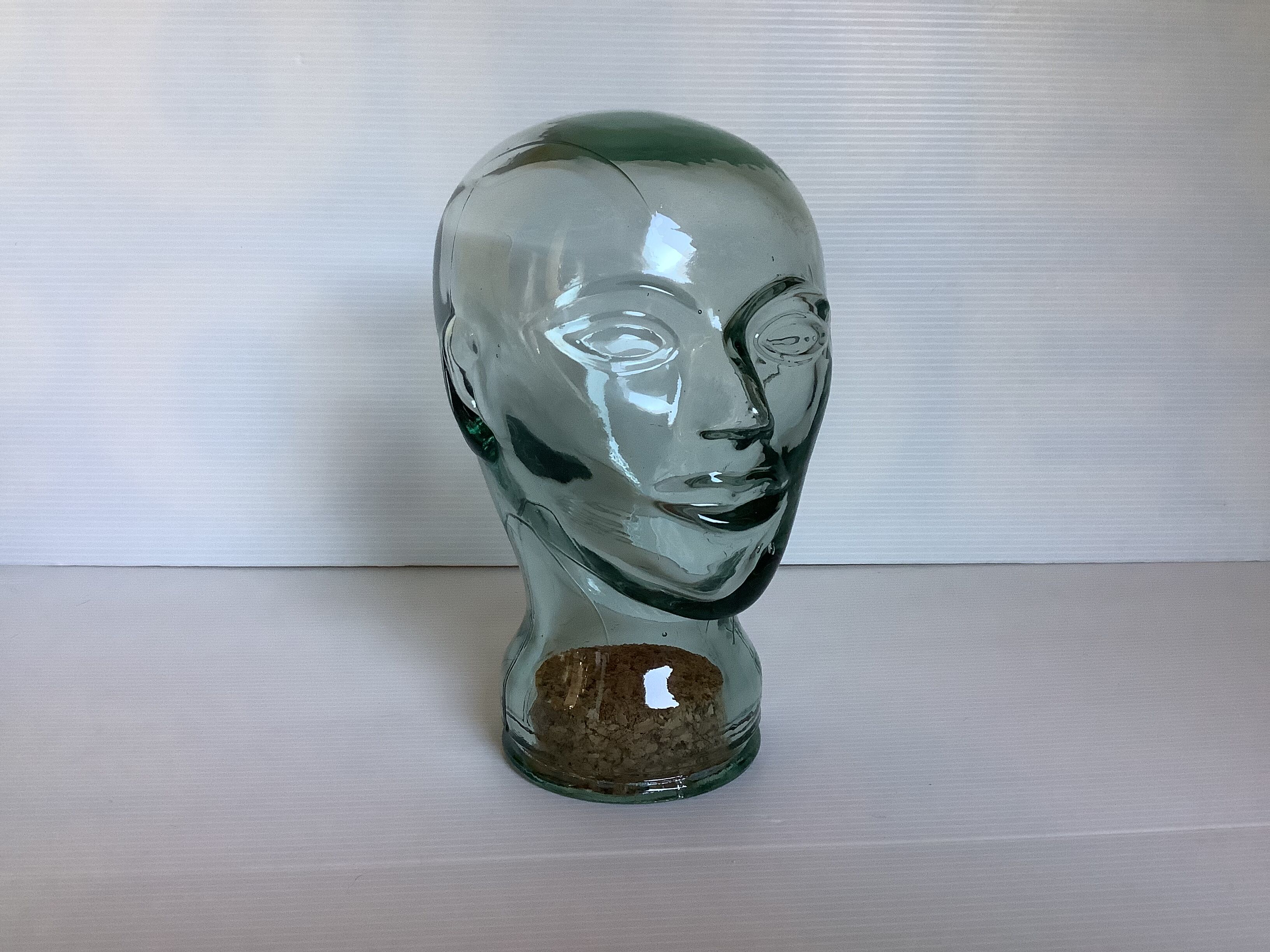 Green glass head