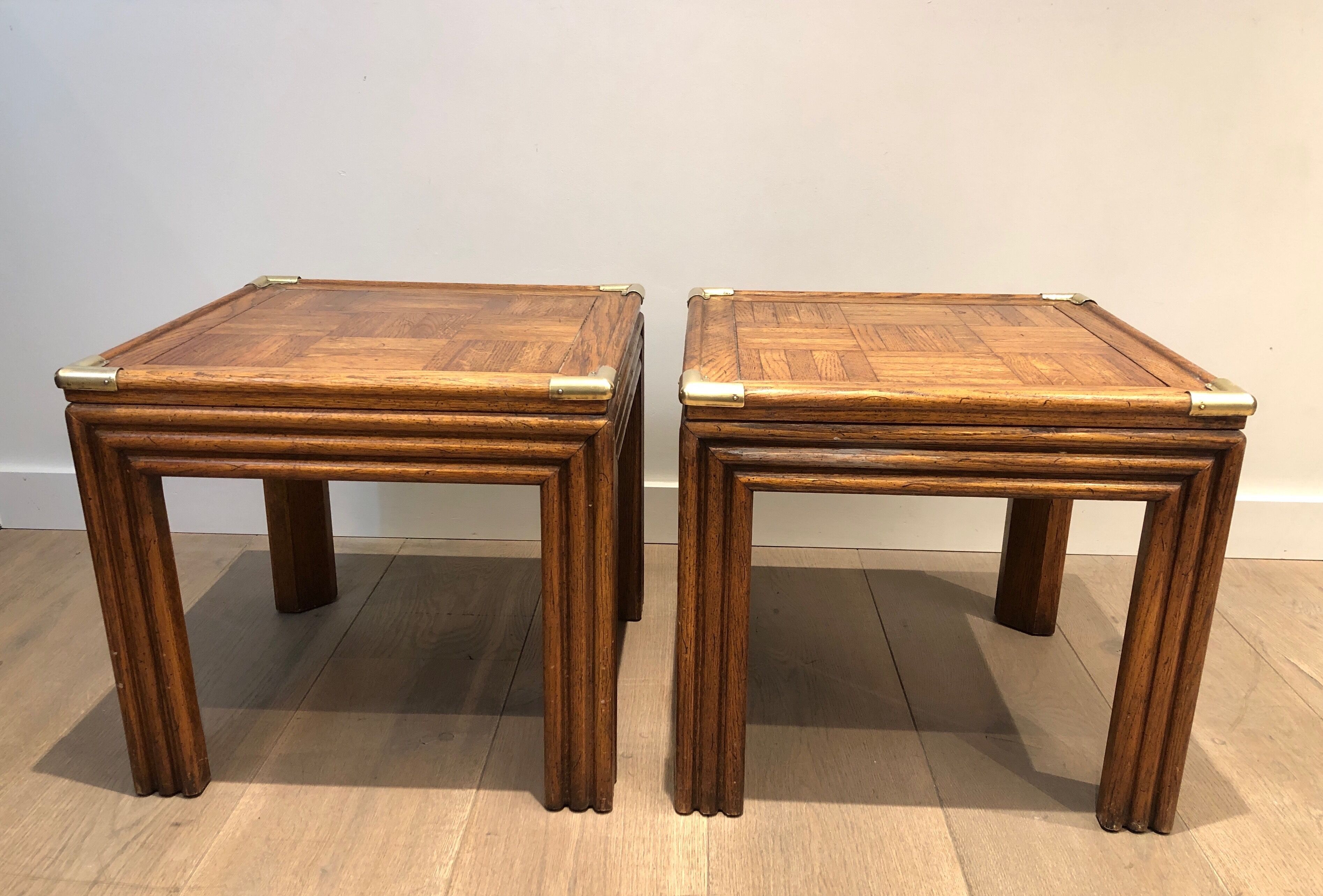 Pair of wooden and brass sofa ends