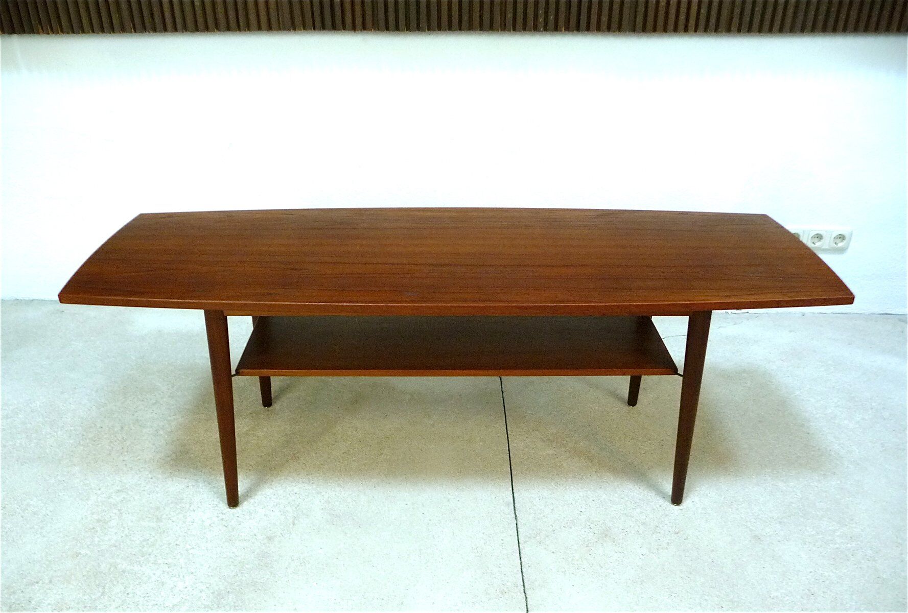 Curved Danish teak coffee table with additional shelf compartment, 1960s