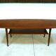 Curved Danish teak coffee table with additional shelf compartment, 1960s