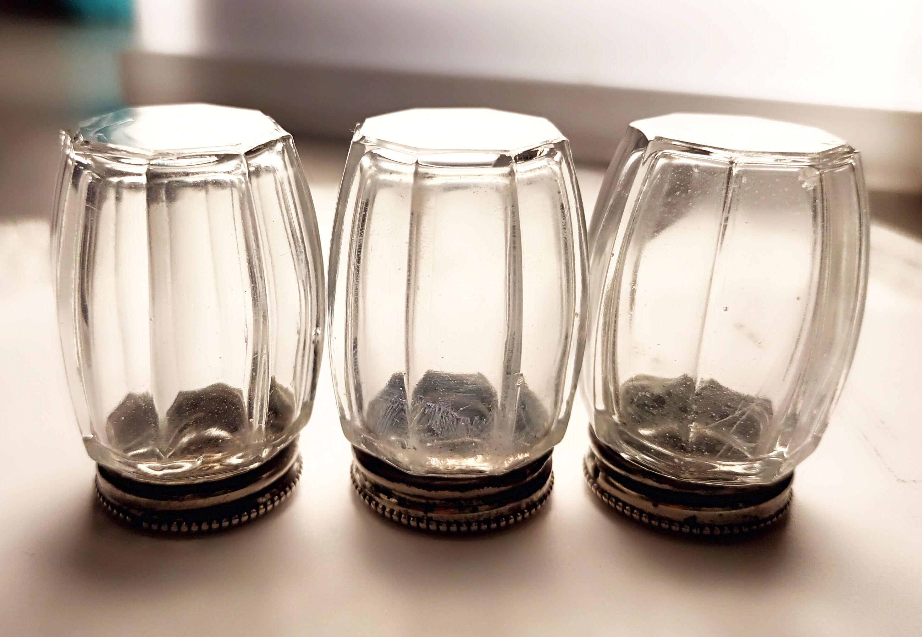 3 crystal and metal salt shakers