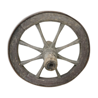 Old wooden cart wheel