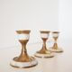 Lot of old candlesticks in brass and mother-of-pearl
