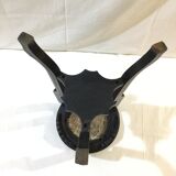 Blackened wooden and marble harness