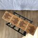 Magazine rack in ceramic and black, orange and brown iron from the 70s
