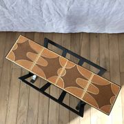 Magazine rack in ceramic and black, orange and brown iron from the 70s