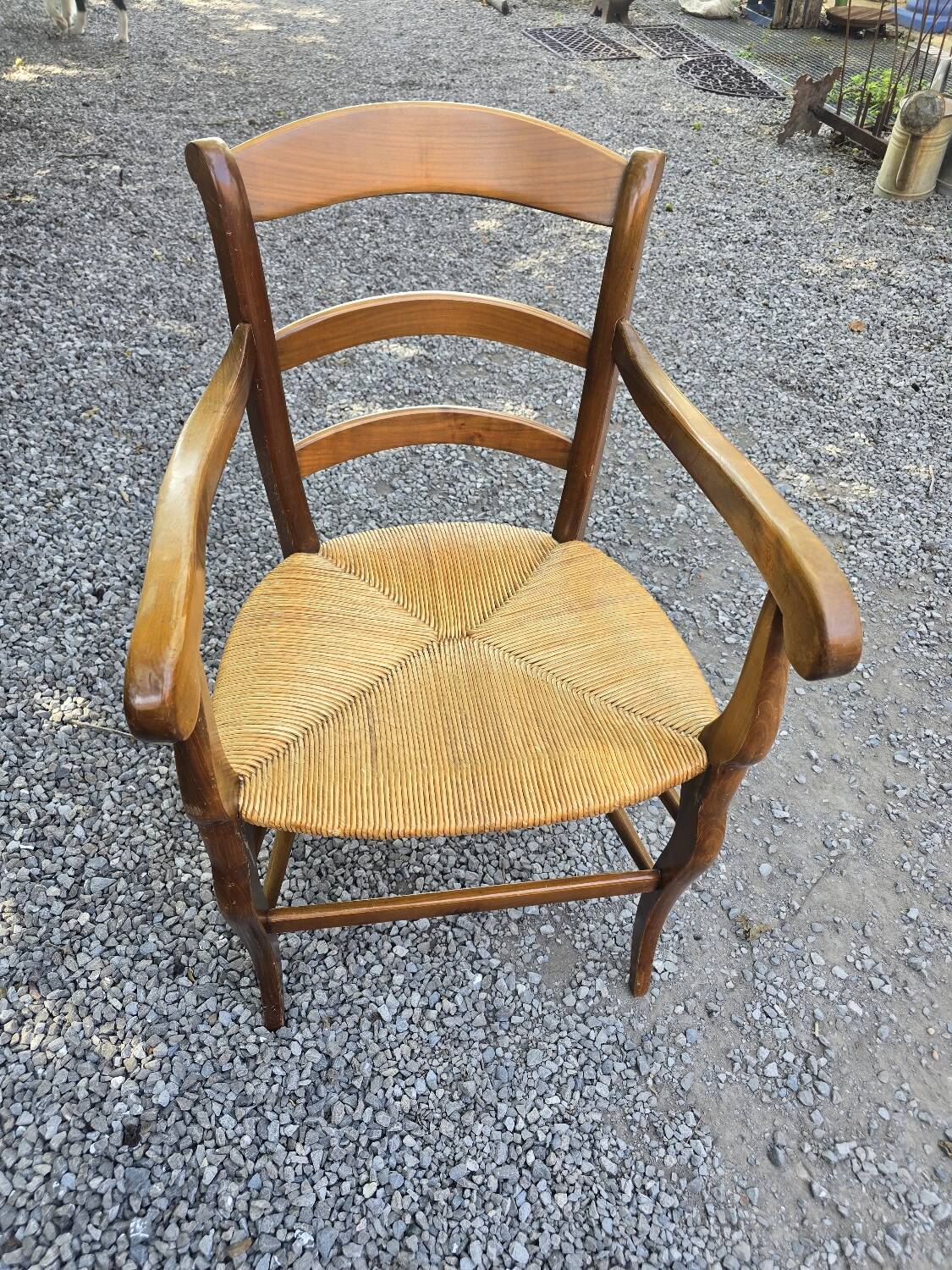 Cherry wood straw armchair