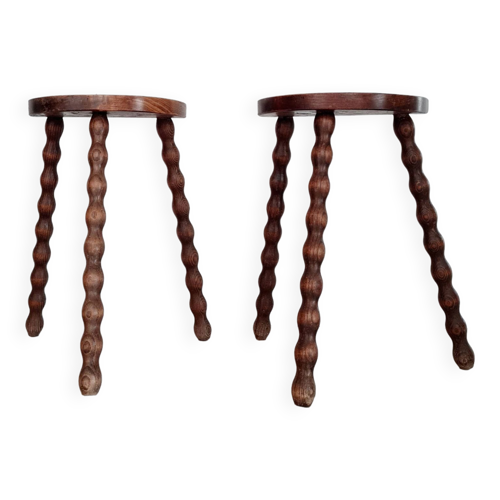 Pair of old wooden tripod stools