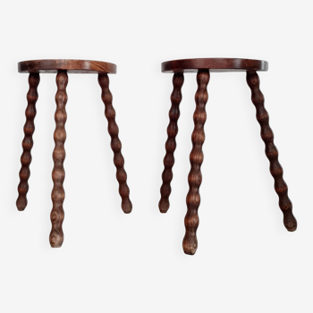 Pair of old wooden tripod stools