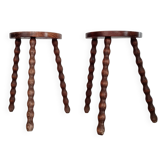 Pair of old wooden tripod stools