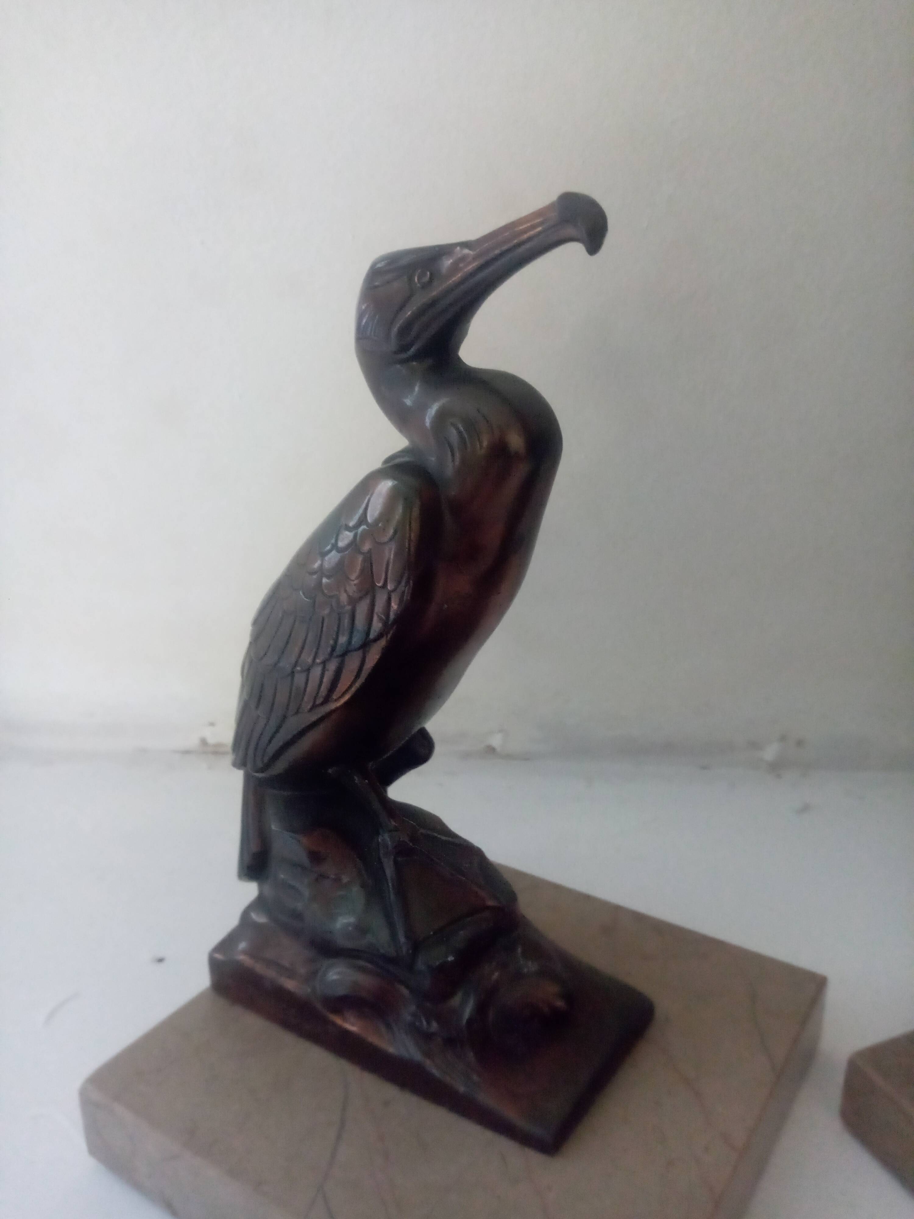 Pelican bookend signed Frecourt
