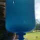 Vase bleu sur piédouche en opaline