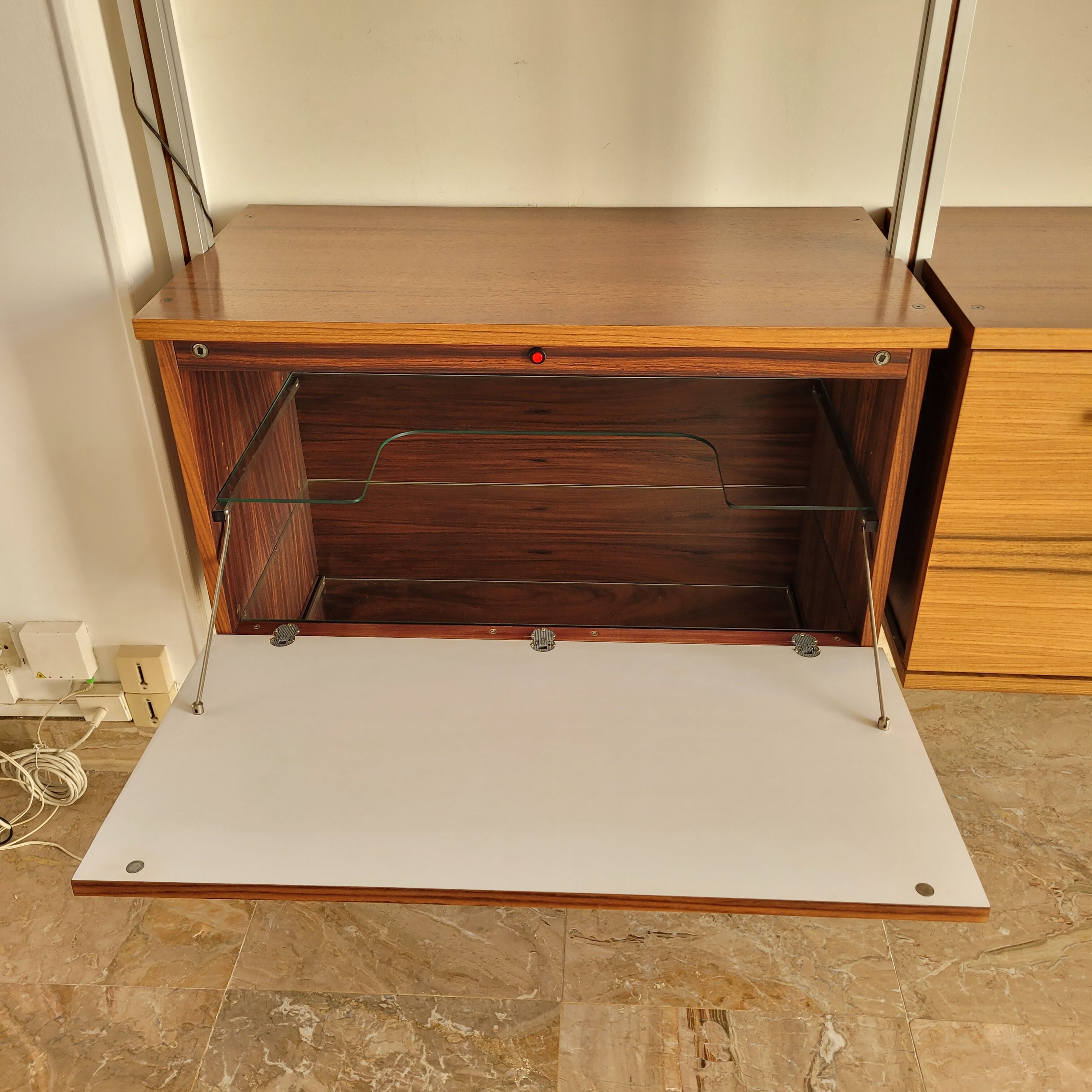 Large Scandinavian wall-mounted wood and aluminum bookcase circa 1960