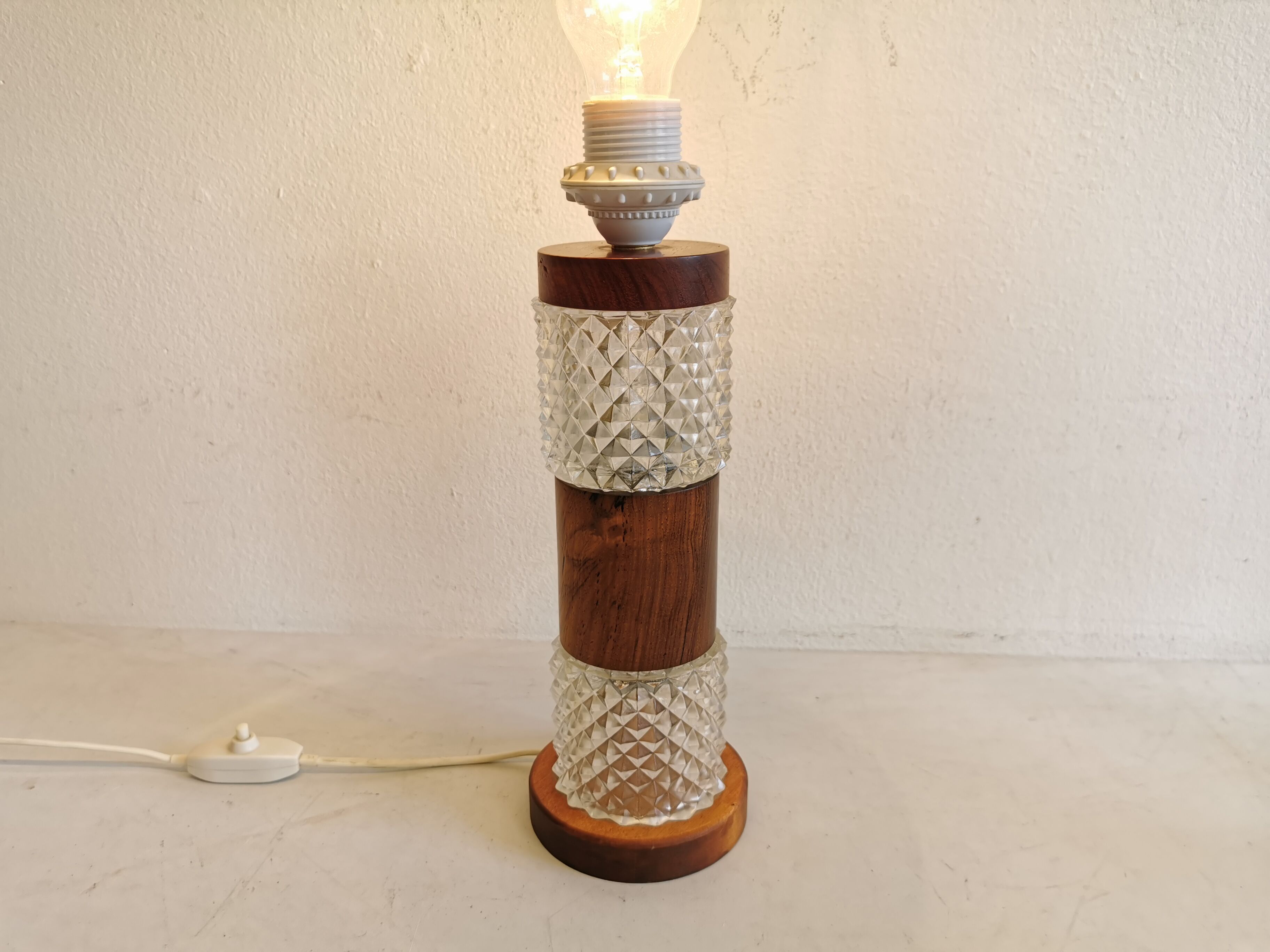 Swedish table lamp, made of what looks like rosewood and crystal glass.