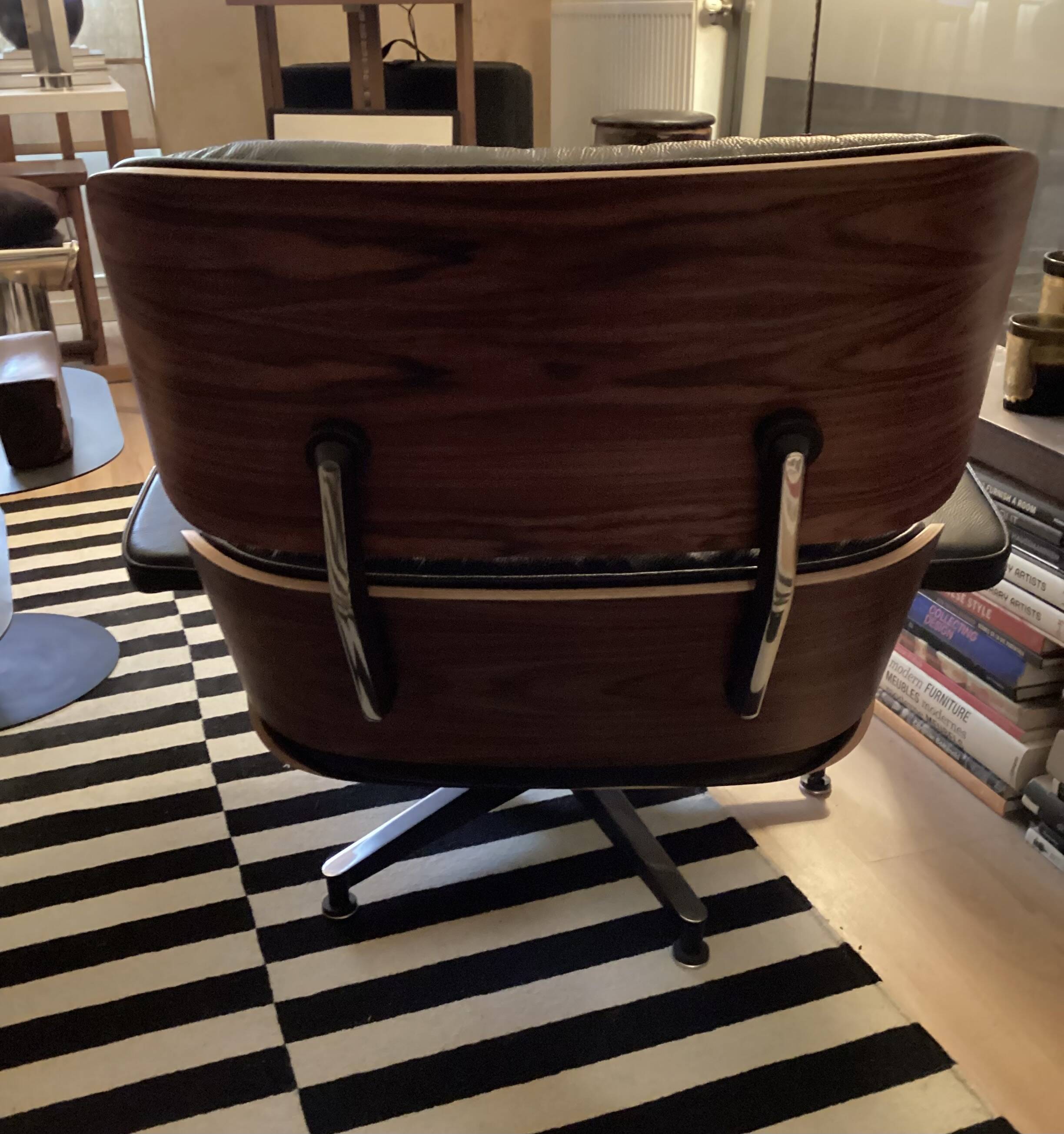 Chair and ottoman by Charles Eames, Herman Miller edition.