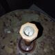 Religious candle holder turned wood