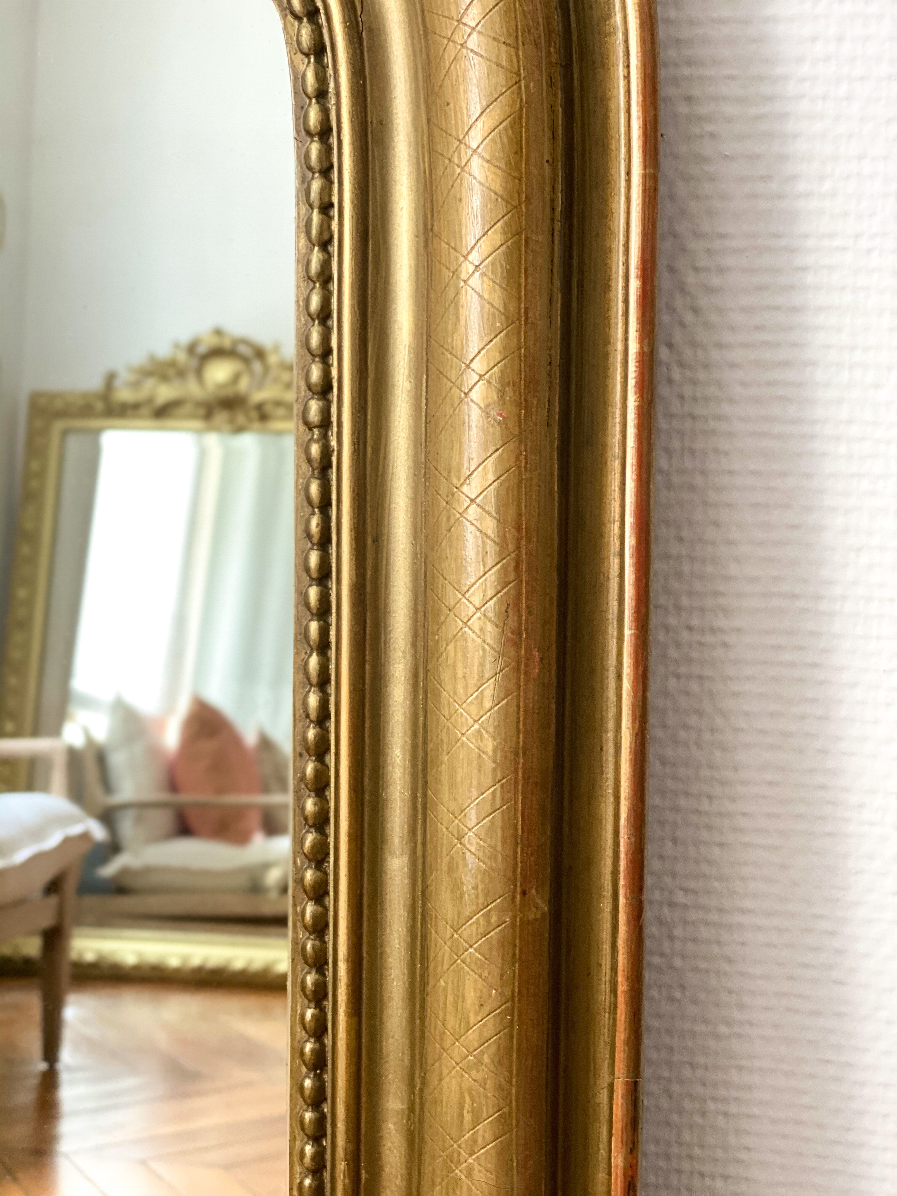 Miroir Louis Philippe perlé doré sculpté 74x98cm
