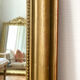 Miroir Louis Philippe perlé doré sculpté 74x98cm