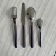 Set of 24 stainless steel and purple plastic cutlery
