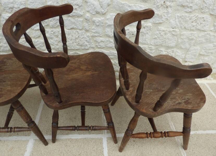 4 solid wood western-style "smoker's chairs" made of oak