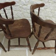4 solid wood chairs in western style called "smockers chairs", in oak.
