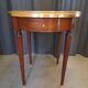 Mahogany and marble bouillotte table