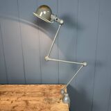 Dark grey Jielde three-arm clamp table lamp