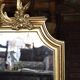 Golden mirror with a flute player angel - 120x82cm
