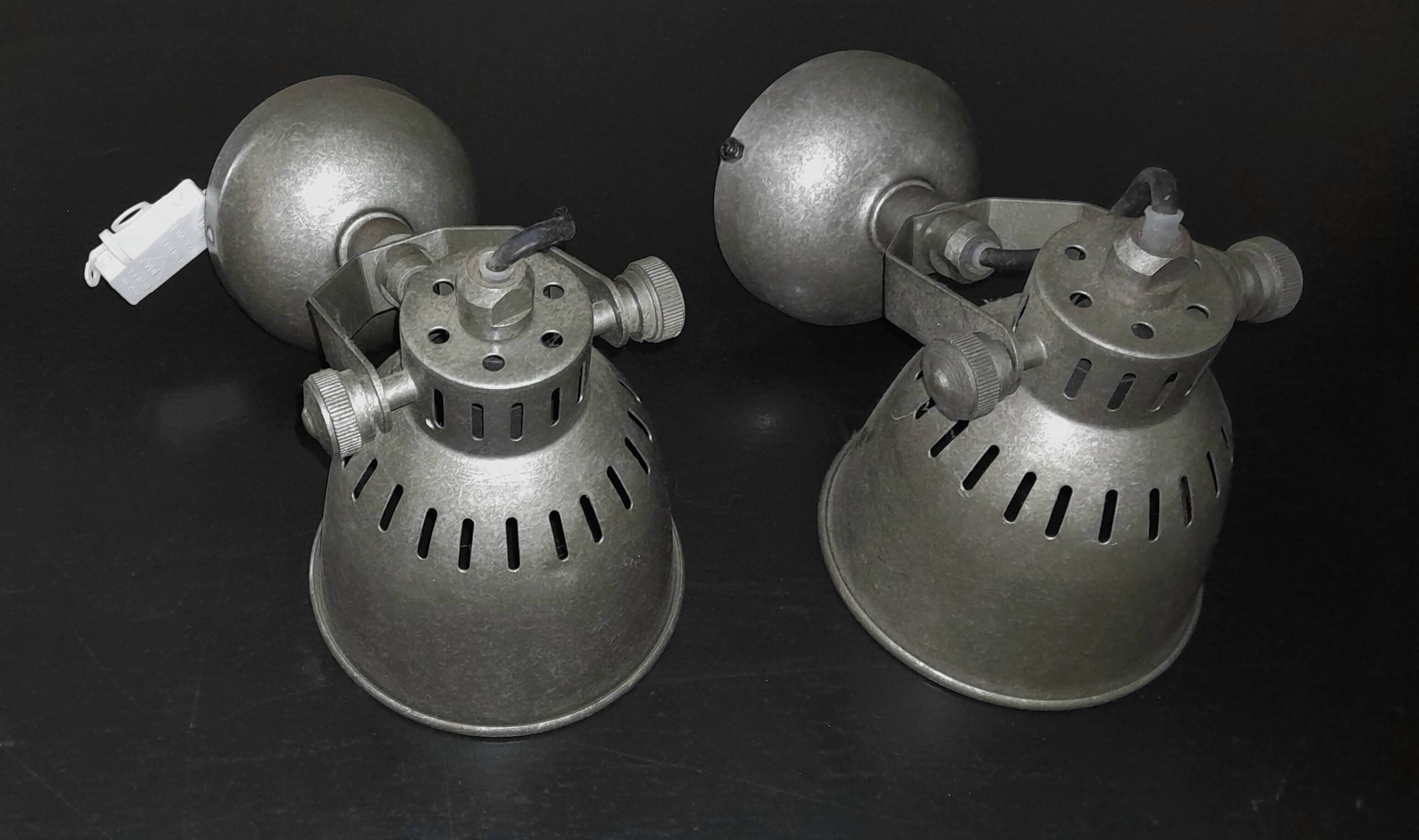 Pair of metal wall sconces