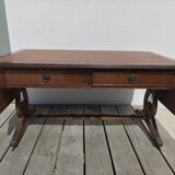 Elegant vintage coffee table, Regency style, in mahogany finish.
