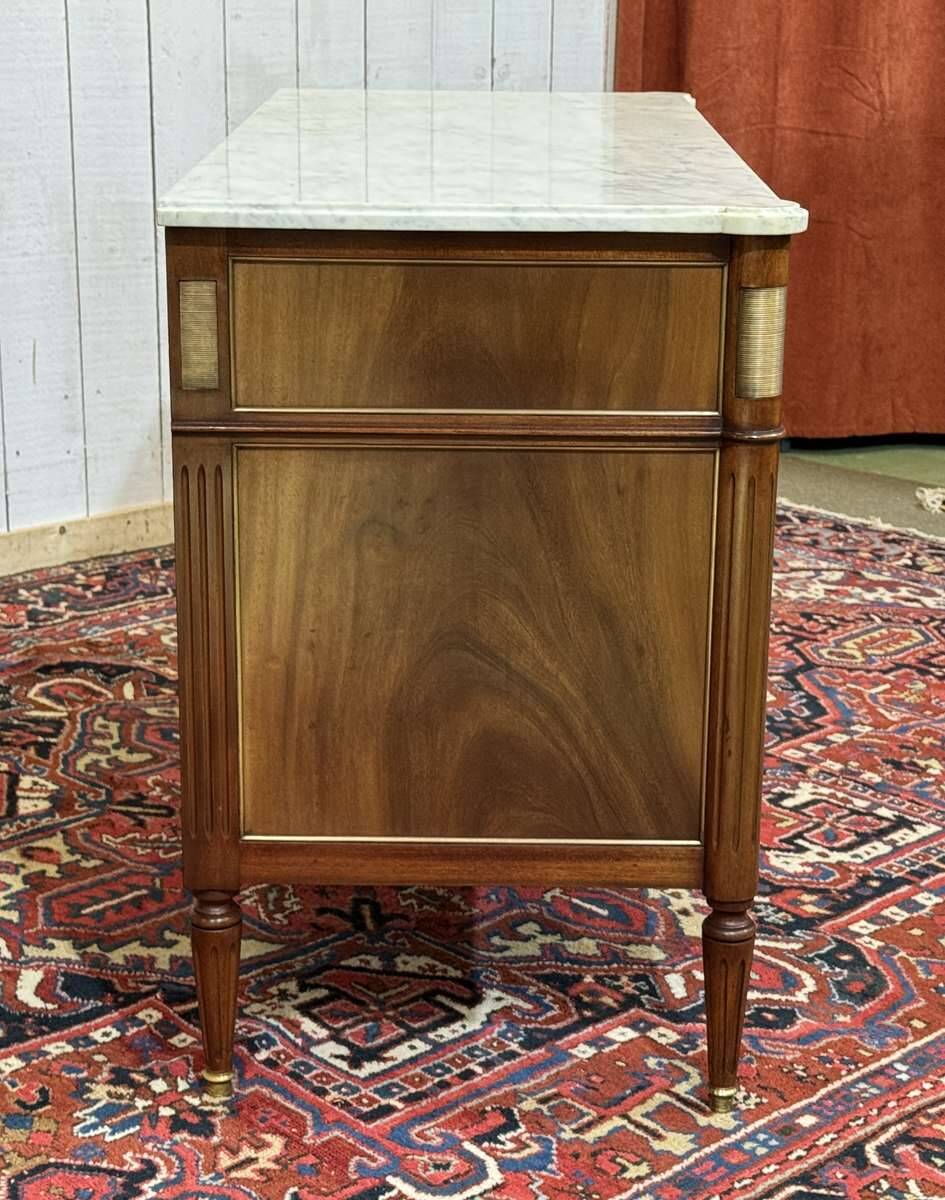 Louis XVI commode in mahogany with a marble top from the 1950s.