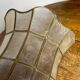 Applique en nacre et laiton