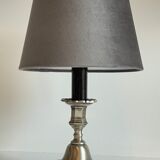 Steel candlestick lamp and grey velvet