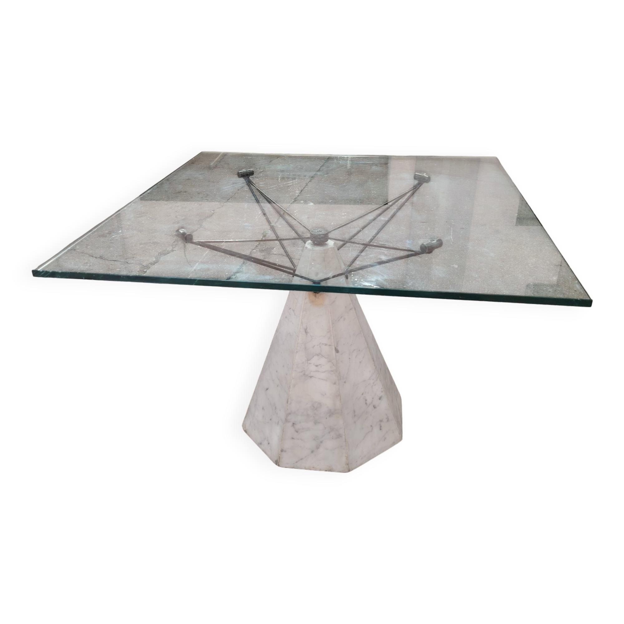 1980s table with a marble and steel base and a square glass top.