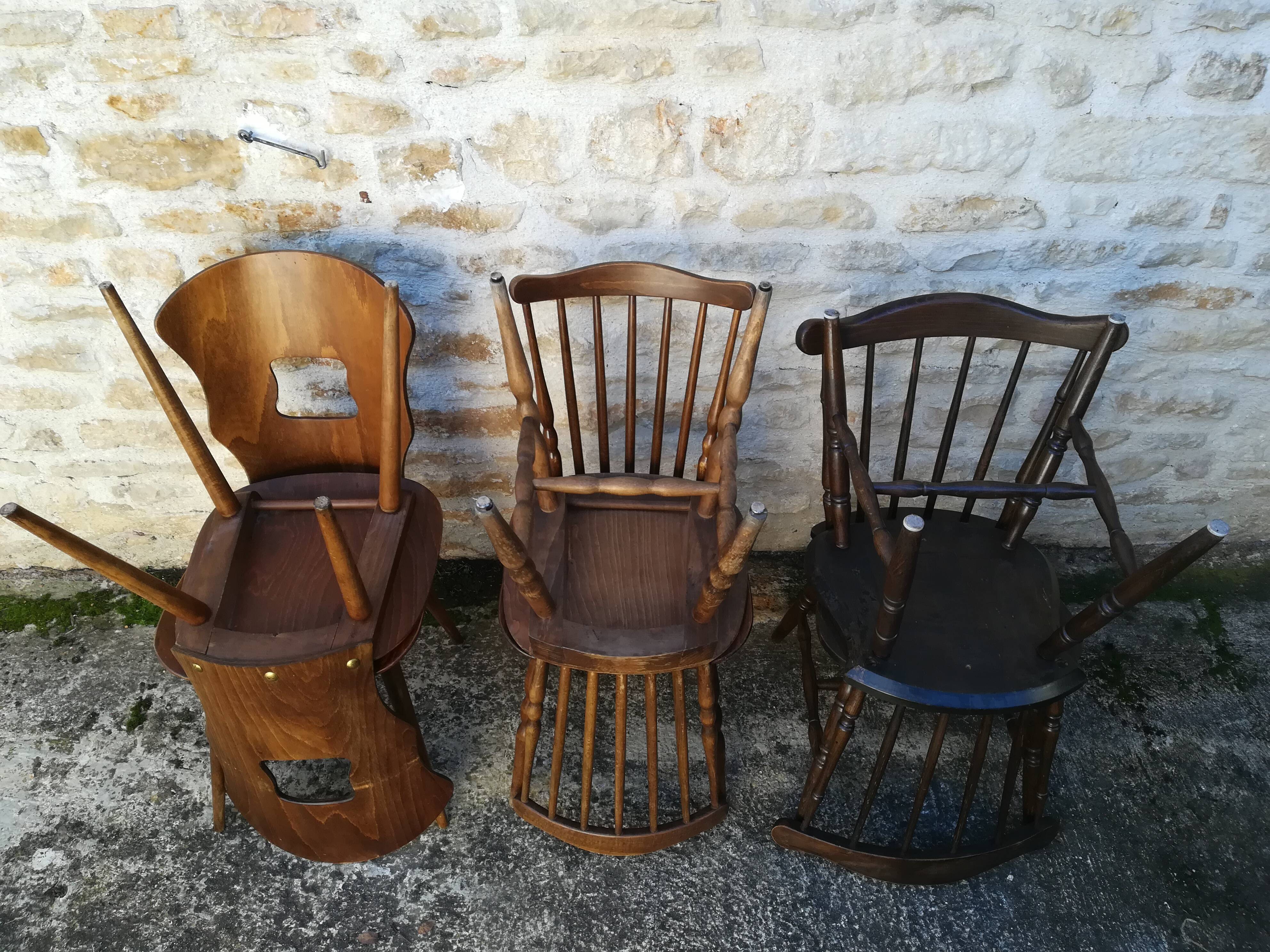 Eight mismatched bistro chairs