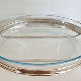 Oval Pyrex gratin dish, silver-plated metal stand.