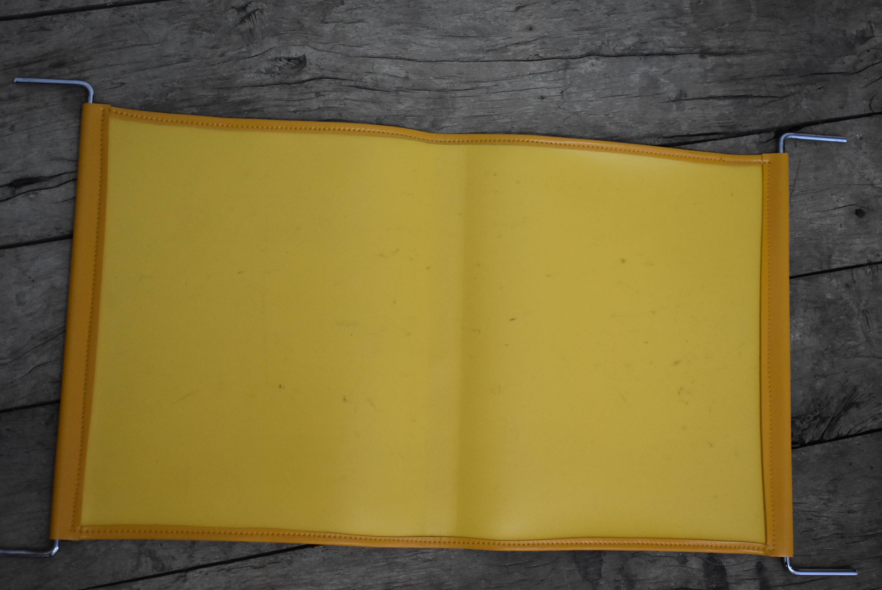 70s Orange magazine holder by Max Sauzé