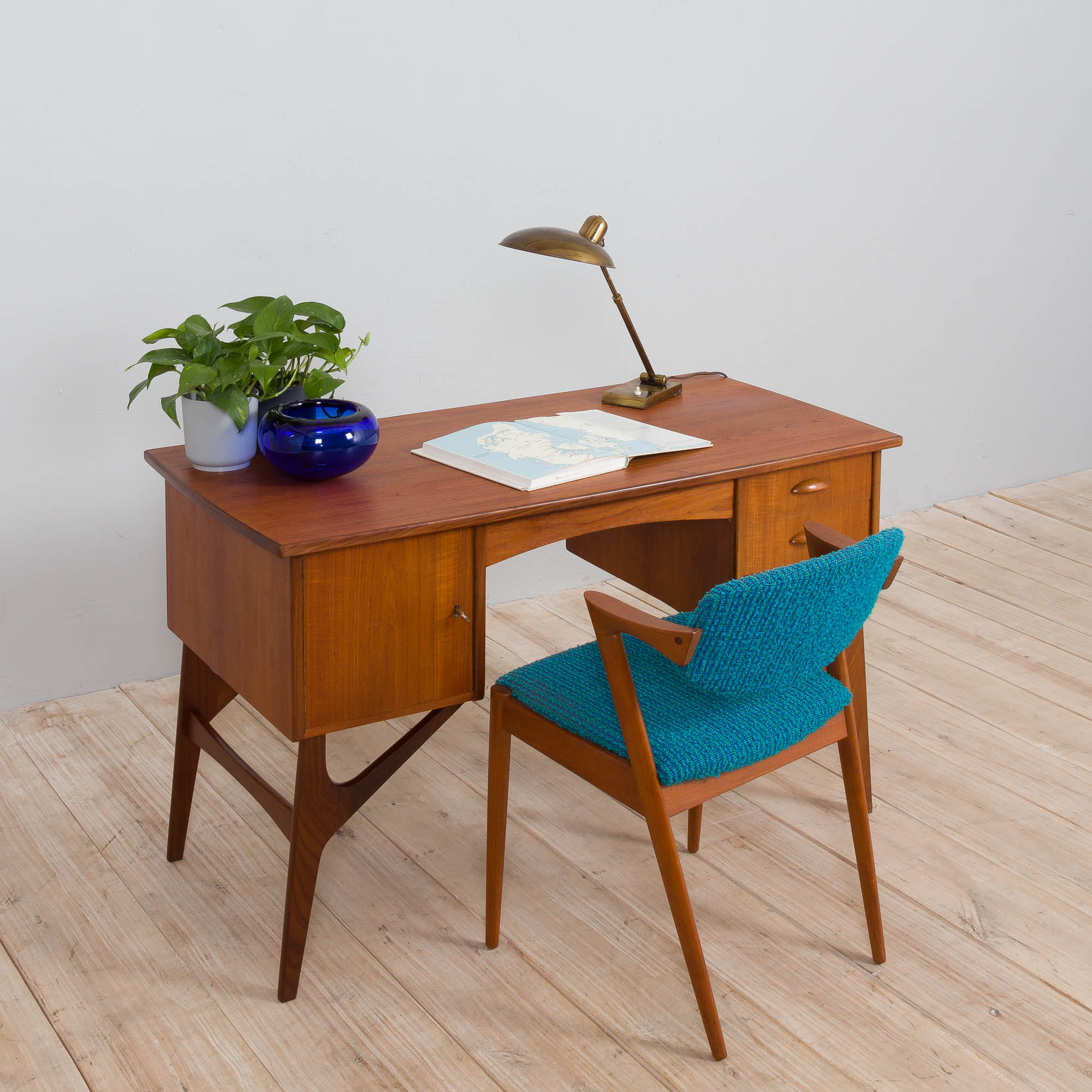 Danish mid century teak desk on sculptural base, 1960s.