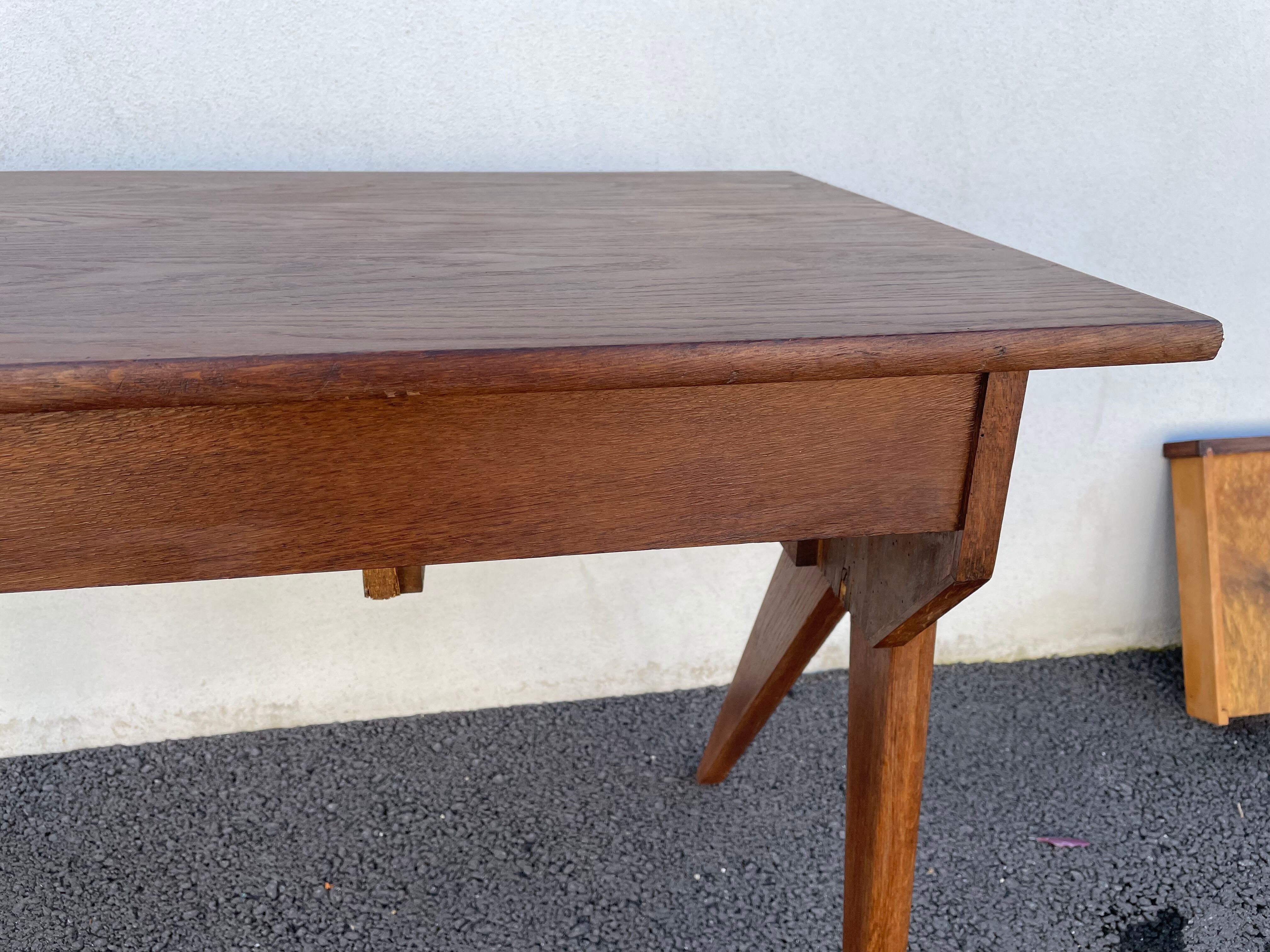 Modernist wooden desk with compass feet 1950