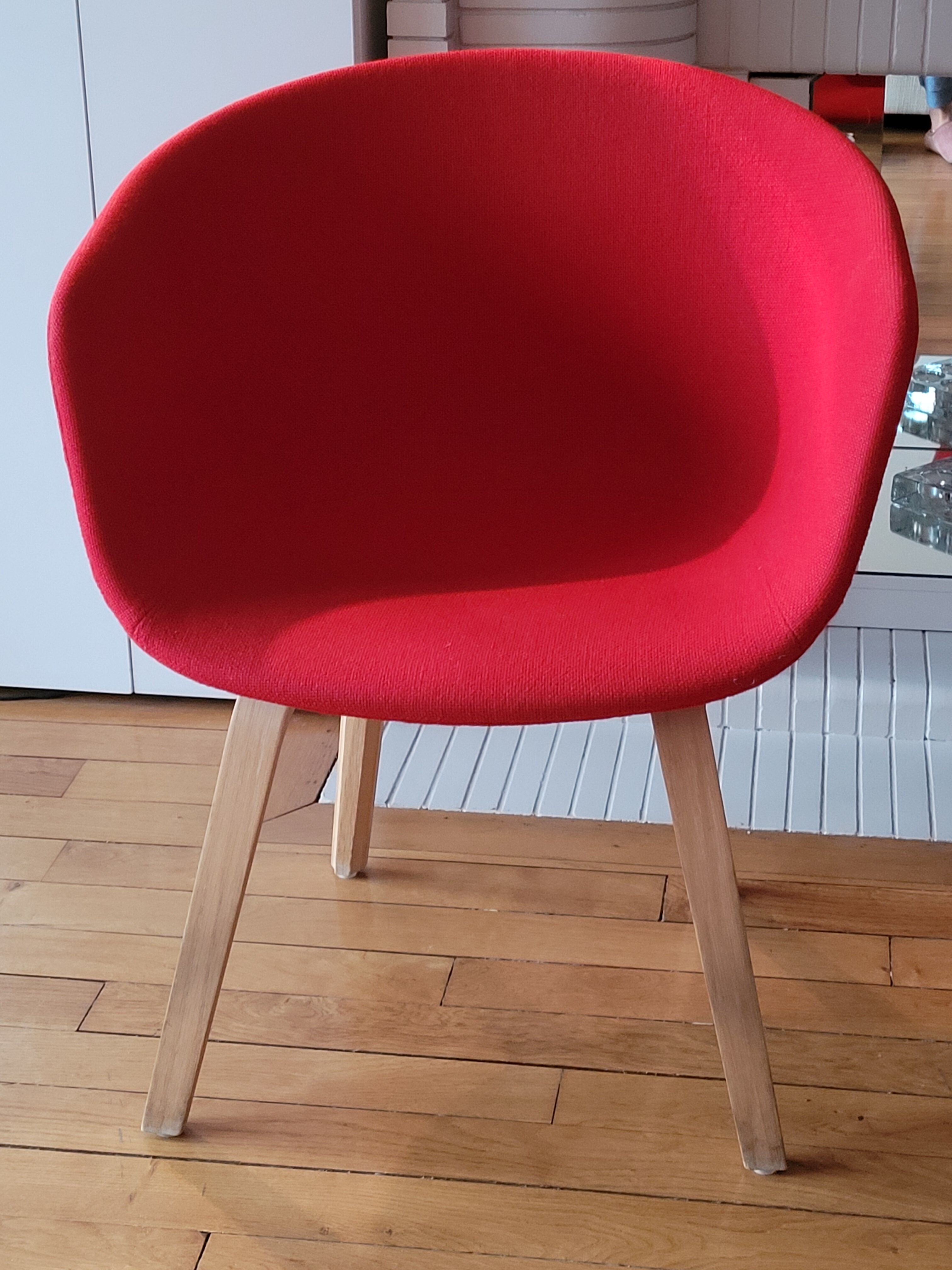 red canvas and wood armchair