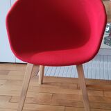 red canvas and wood armchair