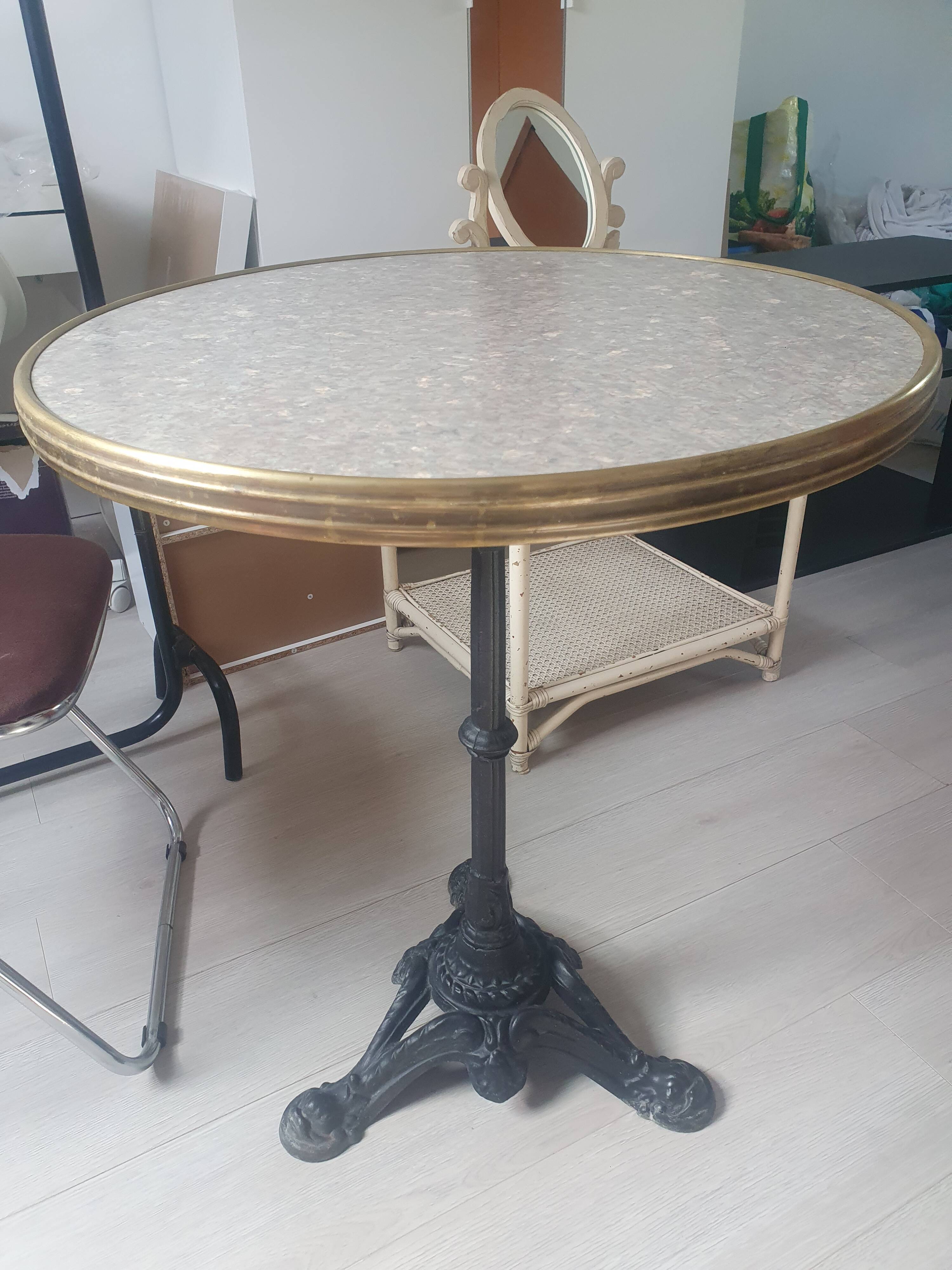 Genuine round bistro table, cast iron legs, brass rim