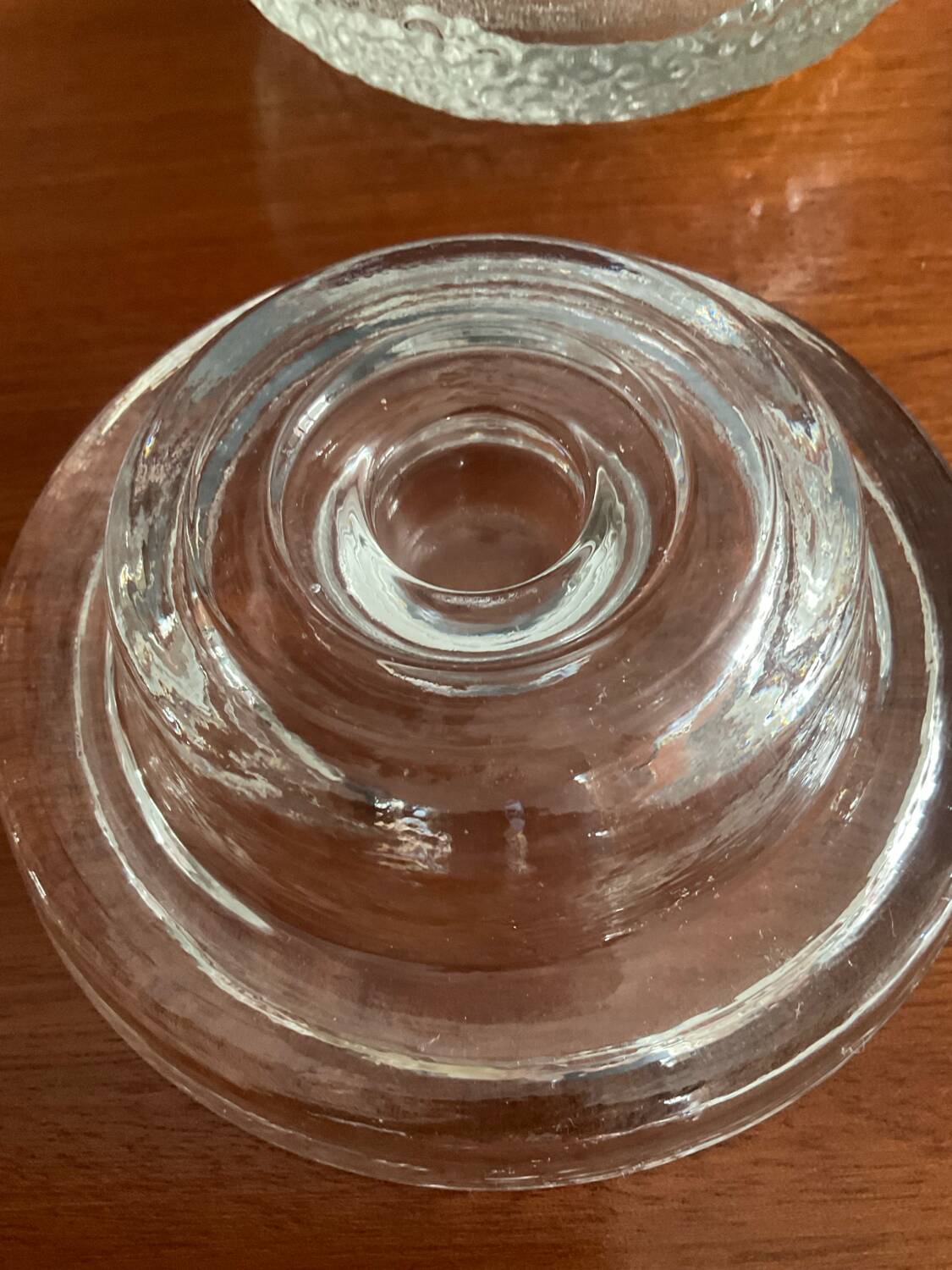 Set of three round thick moulded glass candle holders