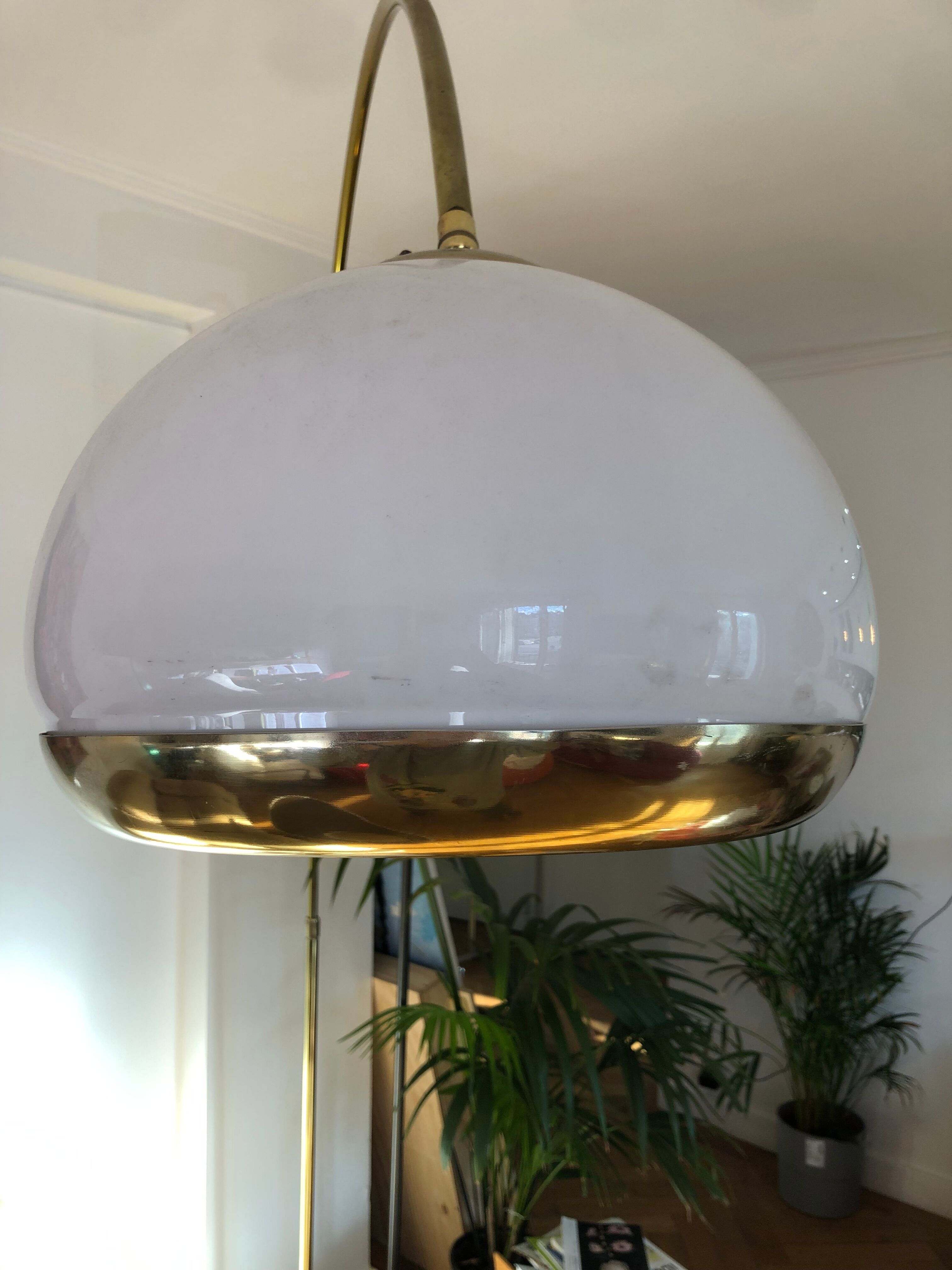 Arc floor lamp by Harvey Guzzini brass model