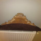 Old wooden pediment stucco